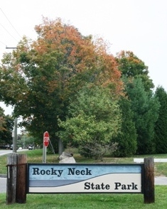 The Rocky Neck State Park sign in the fall The Rocky Neck State Park sign in the fall