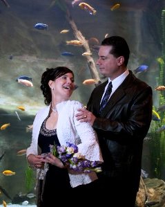 Colorful fish make an impressive wedding background at Mystic Aquarium.