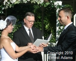 Lindsey repeats her wedding band vows while she puts on Nathan's wedding ring